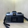 Minolta XG-M + objectif Sigma Zoom 28–80mm f/3.5–4.5