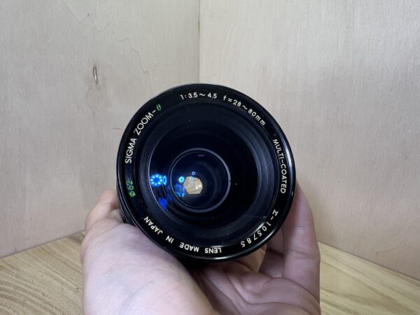 Minolta XG-M + objectif Sigma Zoom 28–80mm f/3.5–4.5
