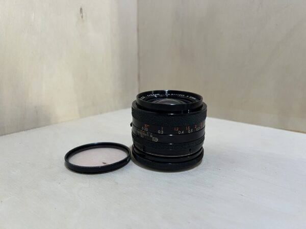 img_4626 Tamron Adaptall-2 24mm f/2.5 BBAR Multi C – Monture Canon FD - Noir- Argent