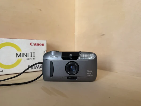 appareil-photo-argentique-canon-prima-mini-ii-boite-occasion-teste-1 Appareil Argentique Compact Canon Prima Mini II – Avec Boîte d'Origine d'occasion, testé et vérifié — photo 1 sur 6