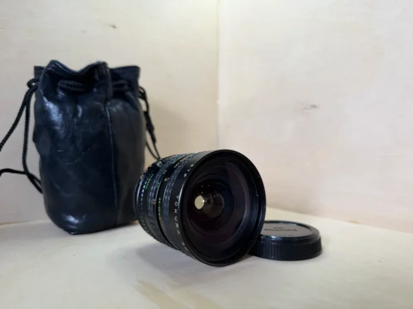 Objectif Vintage Tokura SC 24-50mm f/3.3-4.5 – Monture Olympus OM d'occasion, testé et vérifié — photo 1 sur 6