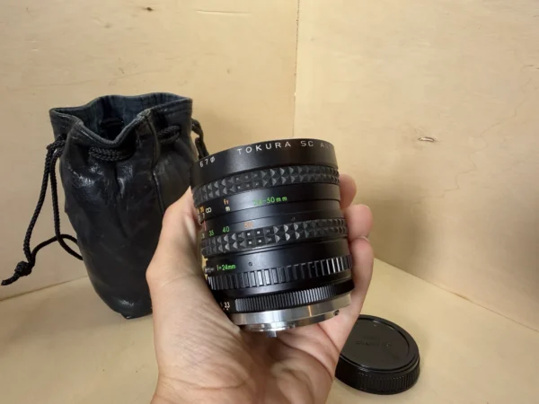 Objectif Vintage Tokura SC 24-50mm f/3.3-4.5 – Monture Olympus OM d'occasion, testé et vérifié — photo 3 sur 6