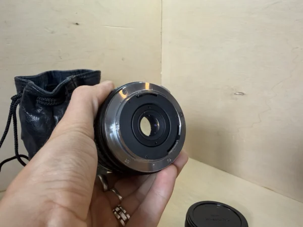 Objectif Vintage Tokura SC 24-50mm f/3.3-4.5 – Monture Olympus OM d'occasion, testé et vérifié — photo 6 sur 6