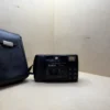 Konica MT-100 compact film camera – Autofocus, 34mm f/4.5, built-in flash – With case Appareil argentique compact Konica MT-100 – Autofocus, 34mm f/4.5, flash intégré – Avec étui